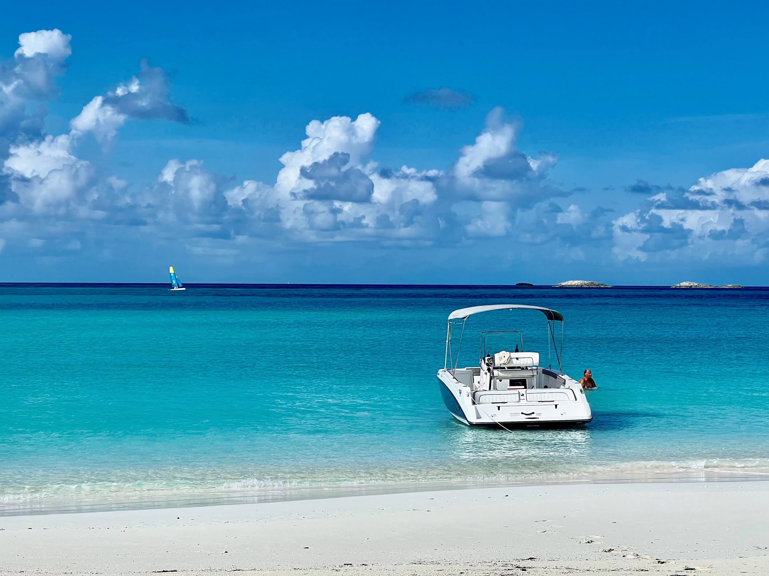 Boat ankered at beach Bahari house Great Exuma Bahamas
