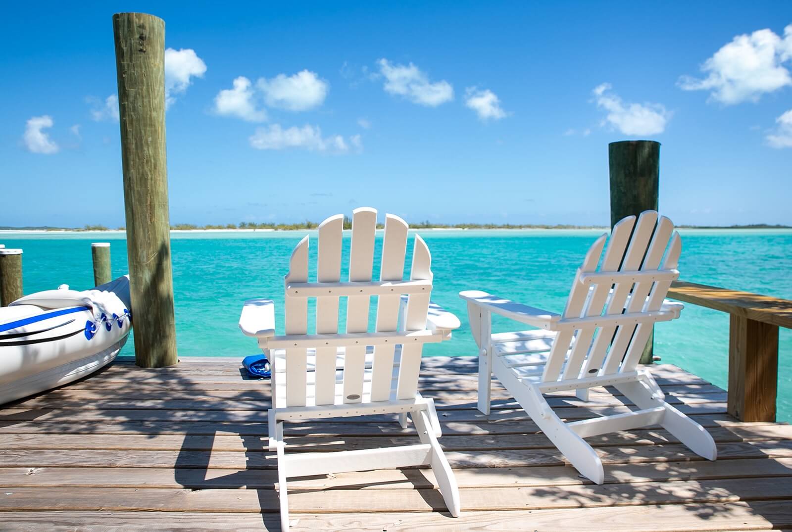 Bootssteg sunchairs Bahari house Great Exuma Bahamas